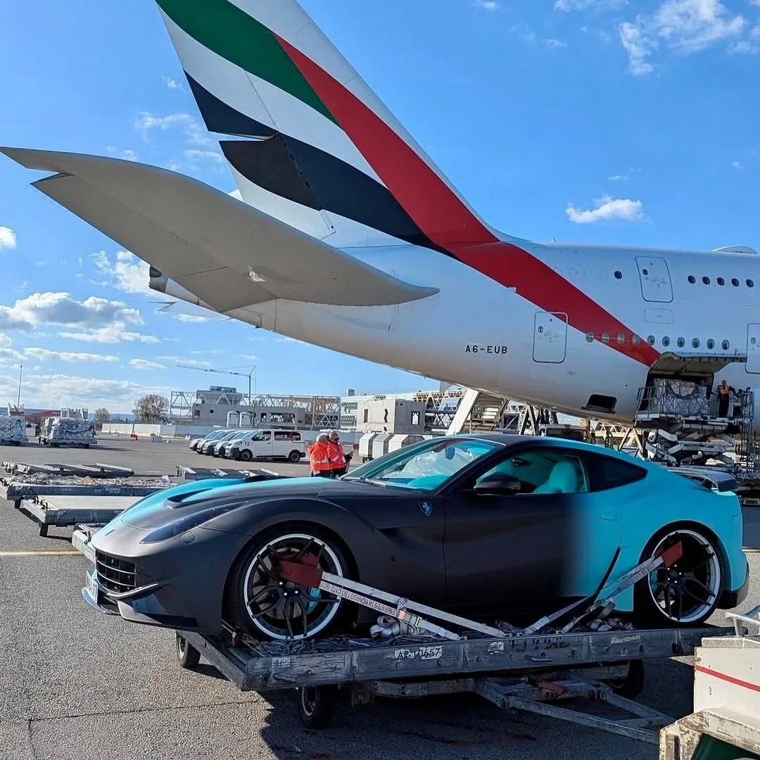Ferrari F12 being loaded onto Emirates cargo